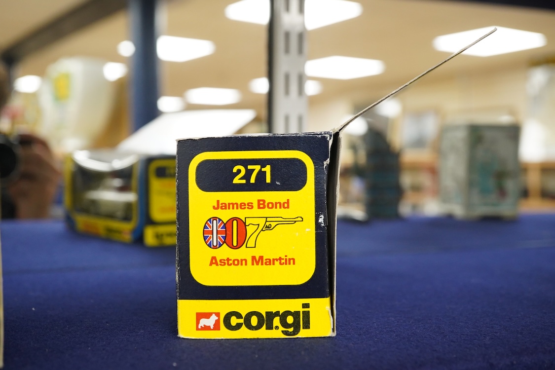 Two boxed 1970s Corgi Toys; a James Bond Aston Martin (261) in silver with passenger, together with a Jaguar XJS (319) in metallic red